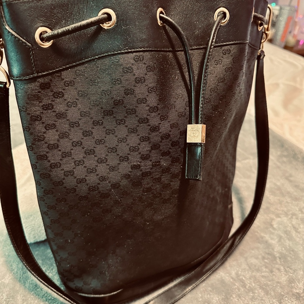 Gucci Black Shoulder Bag with Gold Accents